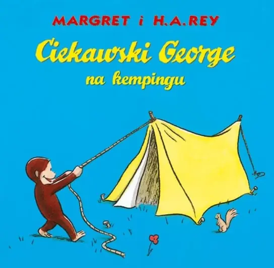 Ciekawski George na kempingu Dostępne od ręki